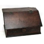 An oak bible box initialled LM and dated 1722 to lid,