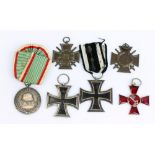 Two German WWI 1914 Iron Crosses (both with indistinct stamps to suspension rings),