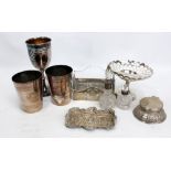 A small group of variously hallmarked silver items to include a circular foliate scroll embossed