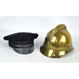 A French brass helmet lacking crest (probably for fire fighter) with leather lining,
