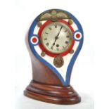 A mantel clock formed from a propeller (possibly Sopwith Pup) with RFC badges and buttons to front