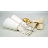 A modern white suede military guard sash with gilt metal buckle and a pair of gauntlets (3).