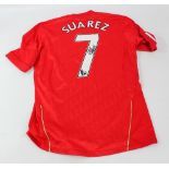 LUIS SUAREZ; a replica Liverpool no.7 shirt, signed to back.