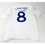 FRANK LAMPARD; a replica Umbro England no.8 shirt, signed to back.