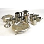 A quantity of pewter including mugs, chamberstick, bowl, etc.