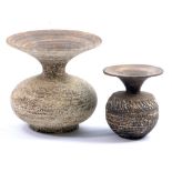 WAISTEL COOPER (1921-2003); two stoneware vases with flared rims, textured surfaces, painted marks,