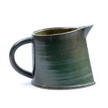 WALTER KEELER (born 1942); a salt-glazed jug with pointed spout, impressed mark, height 17.5cm.