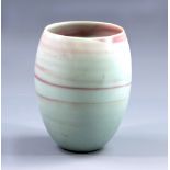 JOANNA CONSTANTINIDIS (1927-2000); a porcelain vase, pink spiral decoration on celadon ground,