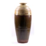 RICHARD BATTERHAM (born 1936); a tall stoneware bottle with green ash glaze to neck and shoulder,