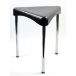 C M, BERVETTI TORINO; a Niagara black plastic, chrome-legged triangular-topped stool, height 41.5cm.