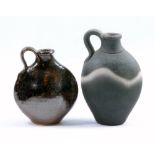 JOHN LEACH (born 1939) for Muchelney Pottery; a stoneware 'black mood' flask and a smaller flask,