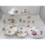 Attributed to Coalport, a quantity of early 19th century dinnerware to include large tureens,