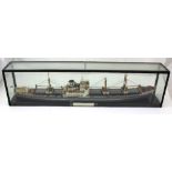 A display case containing a model of the tanker 'M.V. Harpalylus 1959', length 80cm.