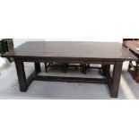 A large modern distressed oak dining table, 76.5 x 220 x 106cm.