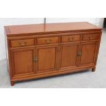 A contemporary Chinese hardwood sideboard with four drawers and cupboard doors, width 152cm.