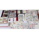 A collection of British and international stamps in albums and loose.