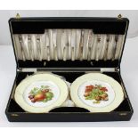 A cased set of plated cake knives and forks and Hammersley Bone China dessert plates,