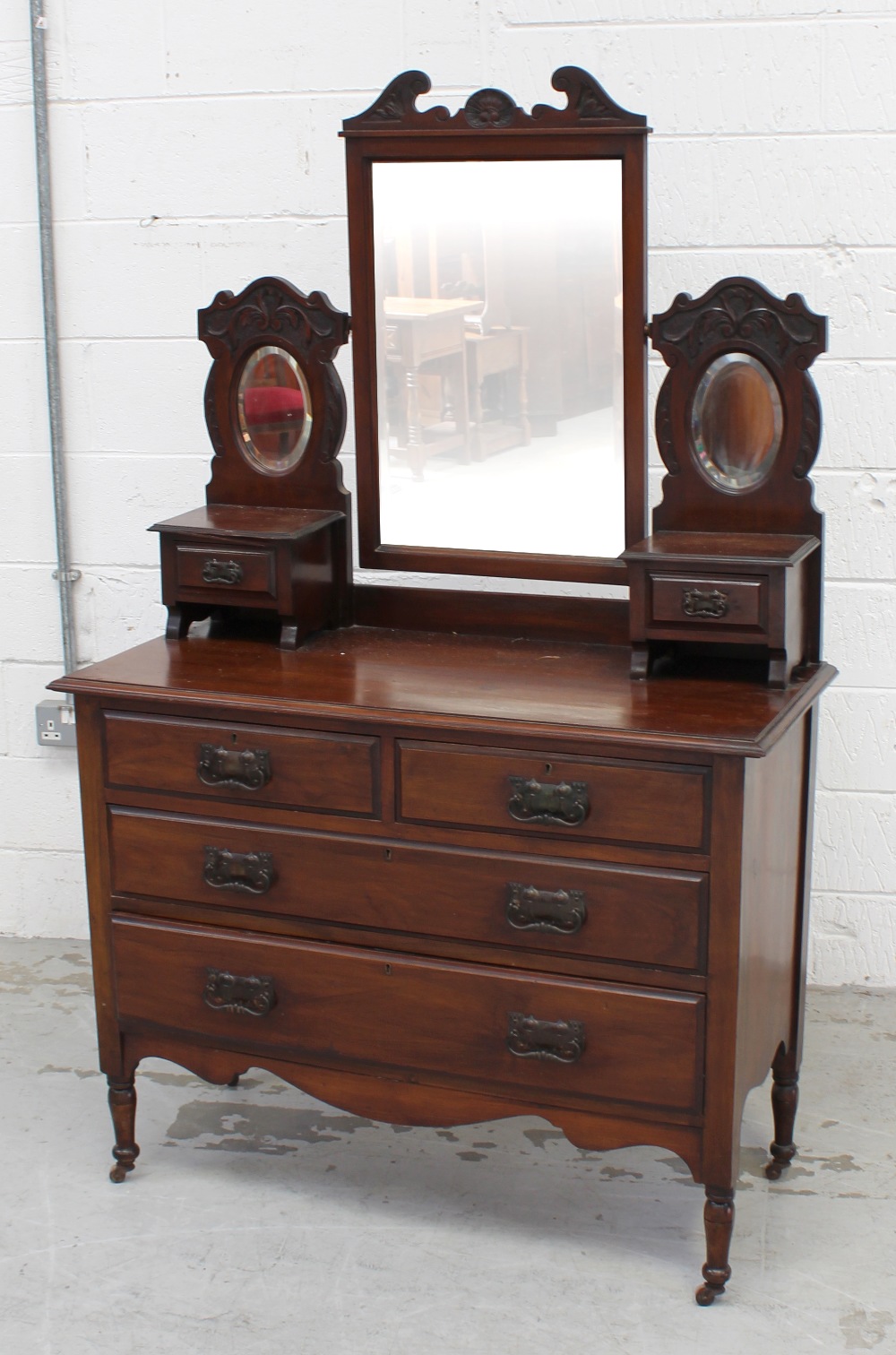 A Belle Époque red walnut dressing chest with swing mirror and jewellery boxes,