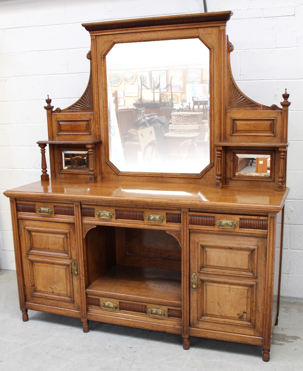 A late Victorian oak mirror-back sideboard,