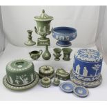 A collection of Wedgwood Jasperware in powder blue and green to include two cheese domes,