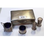 Five hallmarked silver items to include an engine turned silver cigarette box, Birmingham 1948,