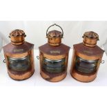 Three copper Dutch mast lamps (two Starboard, one Port) labelled in Dutch, height of each 35cm (3).