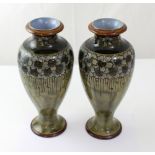 A pair of Royal Doulton Secessionist-style baluster vases decorated with stylised blossoms to a