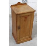 A Victorian oak bedside cabinet, height 73cm.