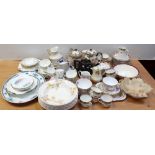 A large quantity of assorted dinner and tea ware to include Royal Grafton, Burleigh ware,