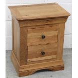 A modern oak bedside cabinet, 64 x 52cm.