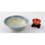 Royal Doulton; a Titanian bowl, diameter 14.5cm and a miniature lustre bowl with hardwood stand (2).