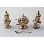 A cased Edwardian hallmarked silver three-piece cruet set,