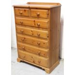 A pine chest of two-over-five drawers, 136 x 91cm.