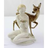 A Hutschenreuther figure group of a female nude with flowers and fawn, height 23.5cm.