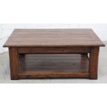 A large modern distressed oak coffee table with shelf stretcher, 36 x 120cm.