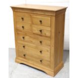 A modern light oak chest of four-over-four drawers, 120 x 98cm.