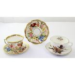 A Hammersley 'Queen Anne' pattern tea trio and a further pheasant-decorated moustache cup and