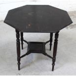 A Victorian octagonal table with under tier, diameter 81cm.