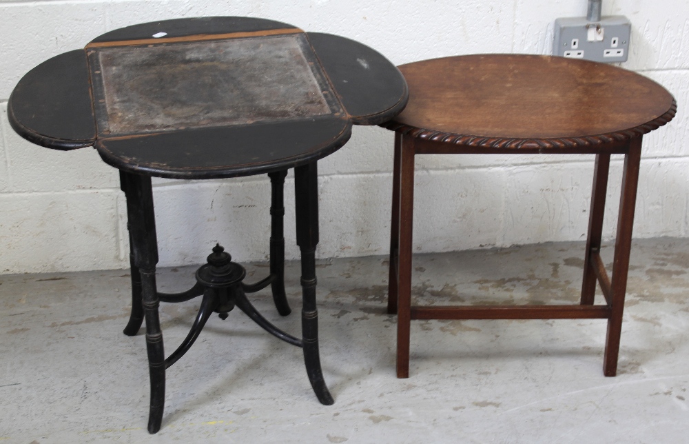 An ebonised drop-leaf occasional table with stretchered supports and an oval occasional table (2).