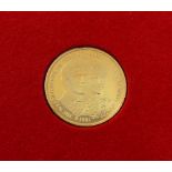 A 1981 Charles and Diana commemorative proof sovereign in Pobjoy Mint book-shaped presentation case