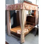 A walnut full tester bed with lined and interlined drapes, length 196cm, width 138cm.