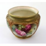 A Royal Worcester hand-painted rose bowl with Royal Worcester date marks to the base for 1912,