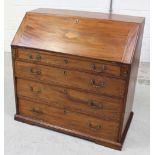 A George III and later mahogany and inlaid bureau,