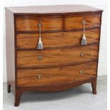 A George III inlaid mahogany bow-front chest of two-over-three drawers to splayed supports,