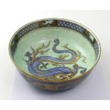 A Wedgwood dragon lustre bowl, printed mark to base, diameter 28.5cm.