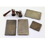 Three hallmarked silver cigarette cases, a silver plated example,