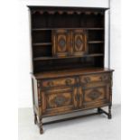 An early 20th century oak dresser,