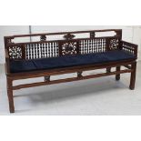 A large Chinese carved hardwood bench, width 200cm.