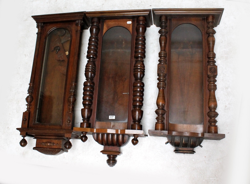 Three circa 1900 walnut and beech cases for Vienna style wall clocks (3).