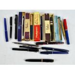 A quantity of pens including a Swan Mabie Todd green bodied example,